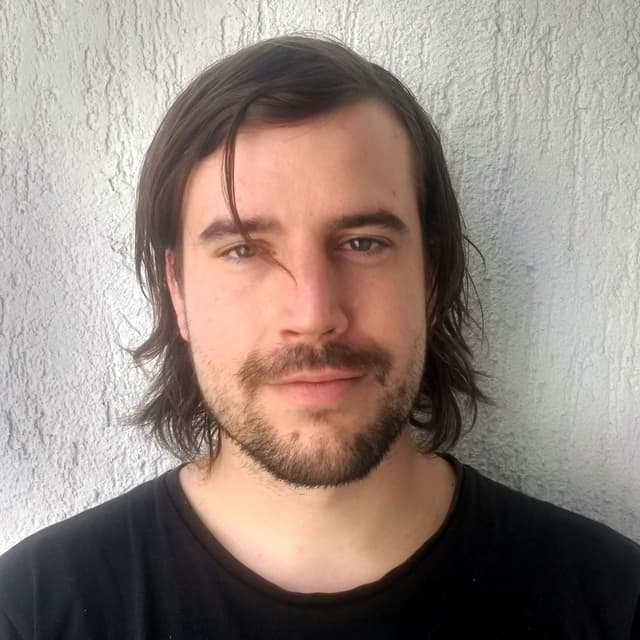 Headshot of Taylor Fairbank (he/they)